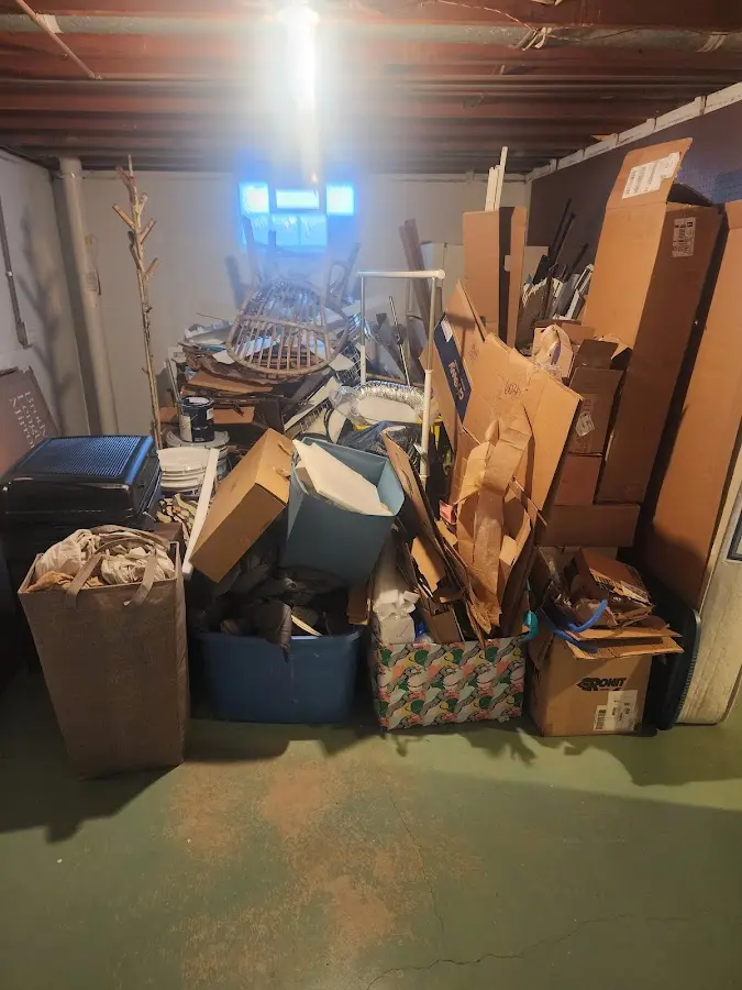 Roll-off dumpster container at job site for 15 Yard Dumpster Rental in Dexter